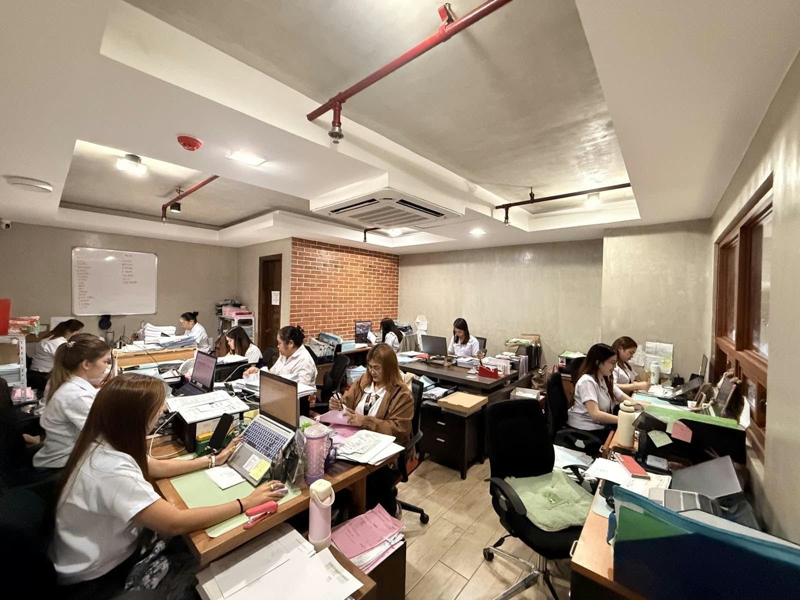 AFL staff at work across desks on the main operations floor
